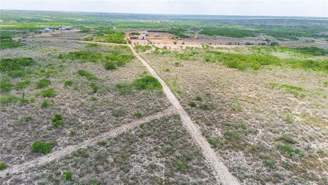 a view of a yard with an outdoor space