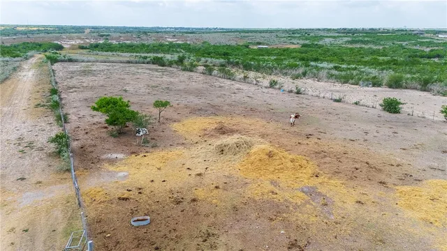 a view of a road with a yard