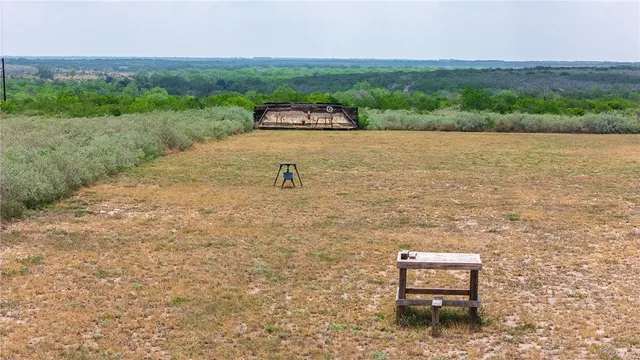 a view of a backyard with a trees
