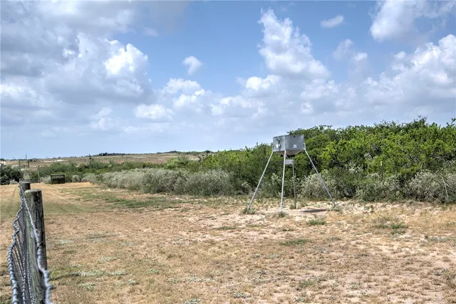 a view of a lake with a big yard