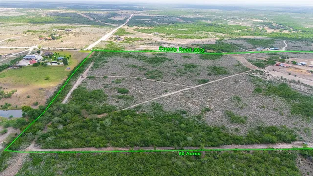 a view of a city with an ocean