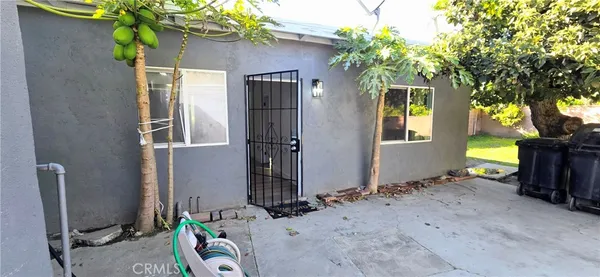 a front view of a house with yard