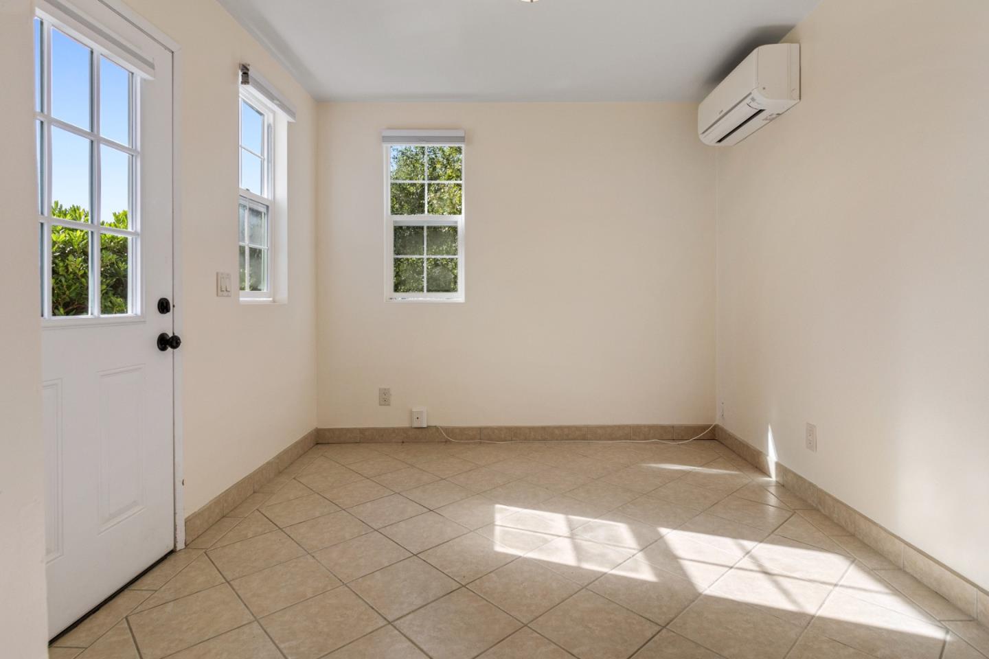 320 El Caminito Road Carmel Valley, CA 93924 - Photo 51 of 62 an empty room with windows