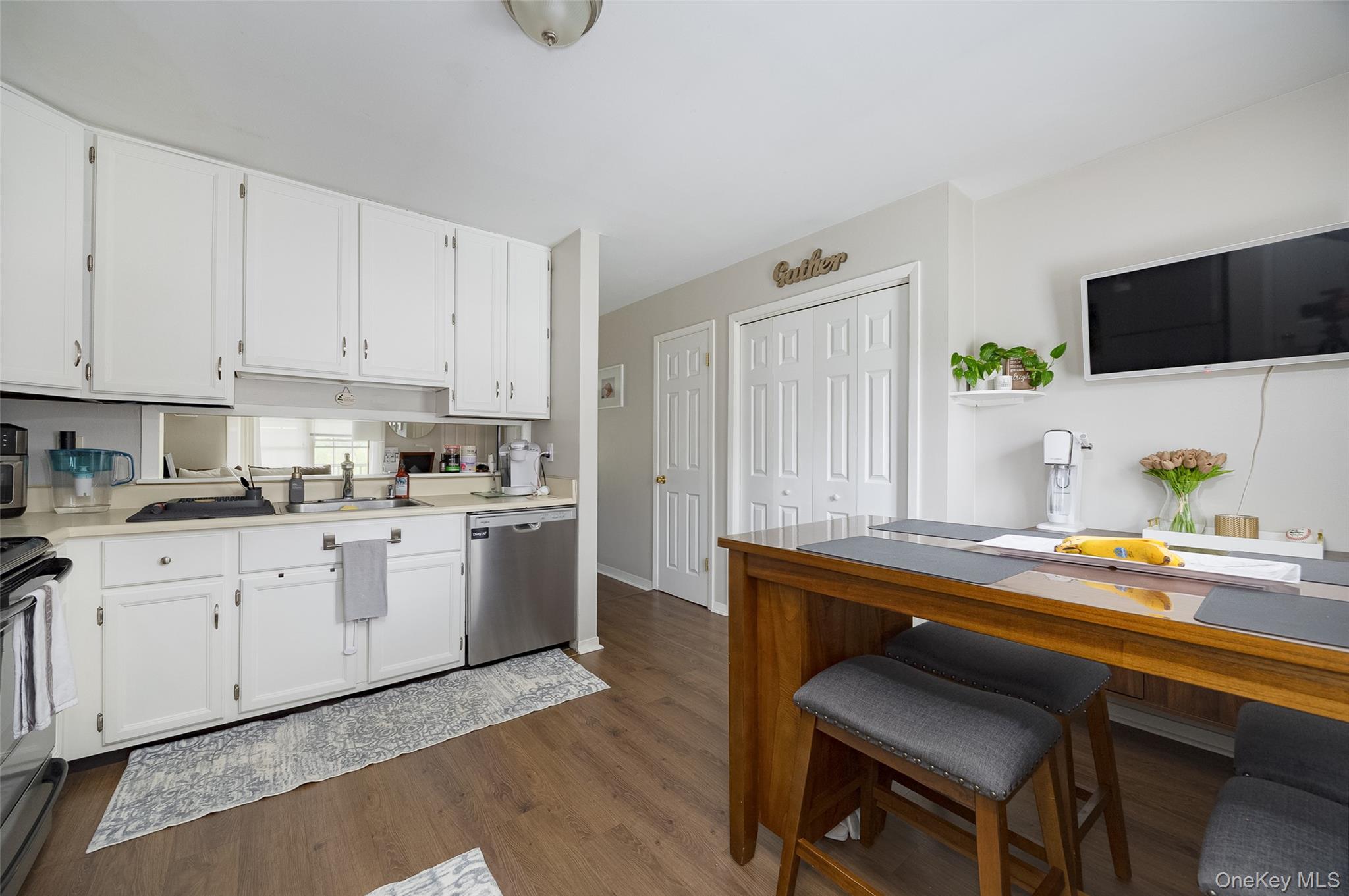 178 Overlook Road Poughkeepsie, NY 12603 - Photo 13 of 30 a kitchen with a sink cabinets and wooden floor