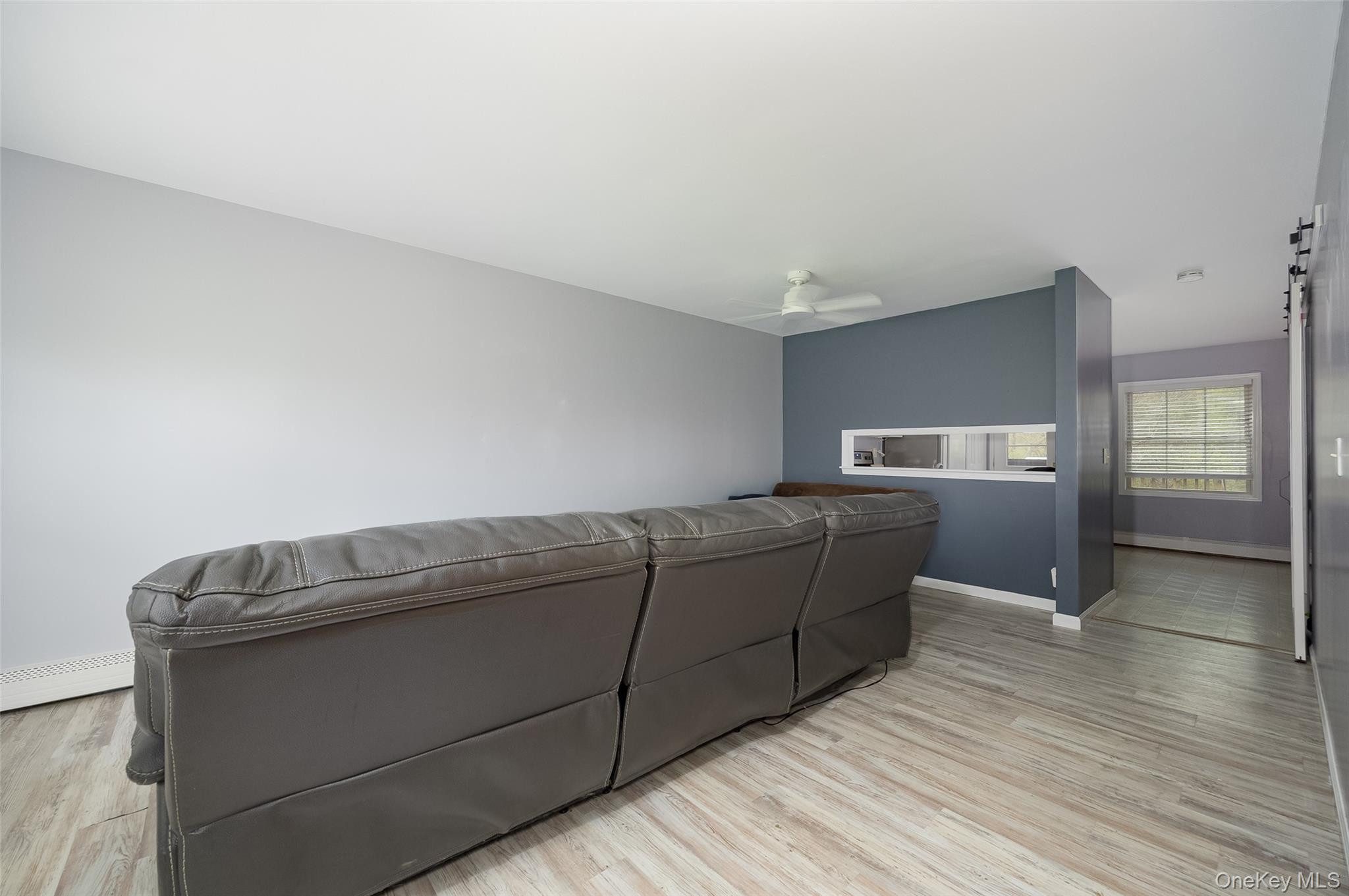 178 Overlook Road Poughkeepsie, NY 12603 - Photo 18 of 30 a living room with a couch and wooden floor