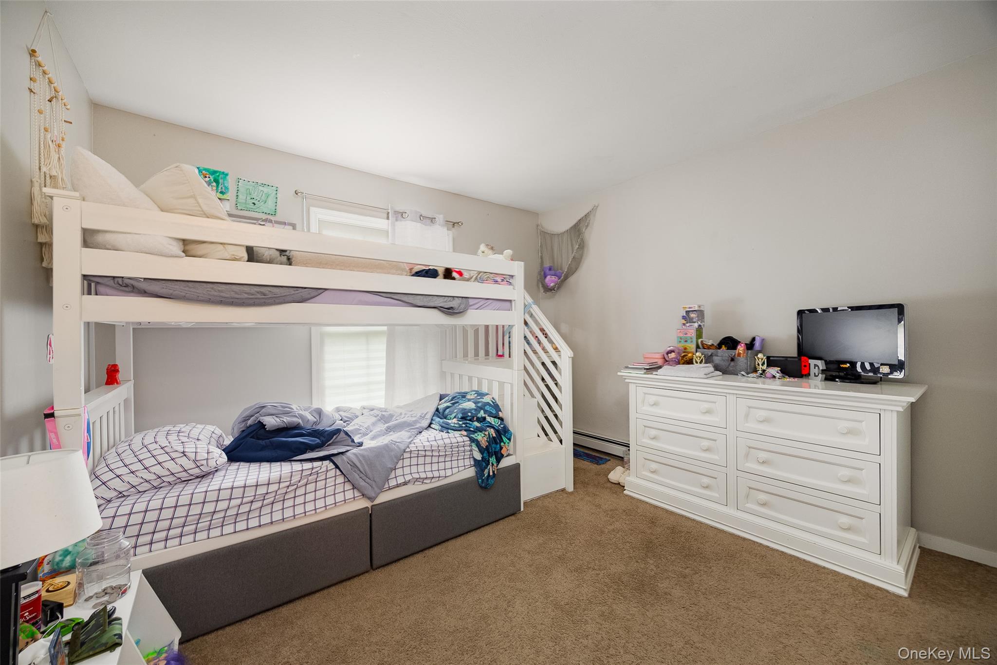 178 Overlook Road Poughkeepsie, NY 12603 - Photo 23 of 30 a bedroom with furniture and a chandelier