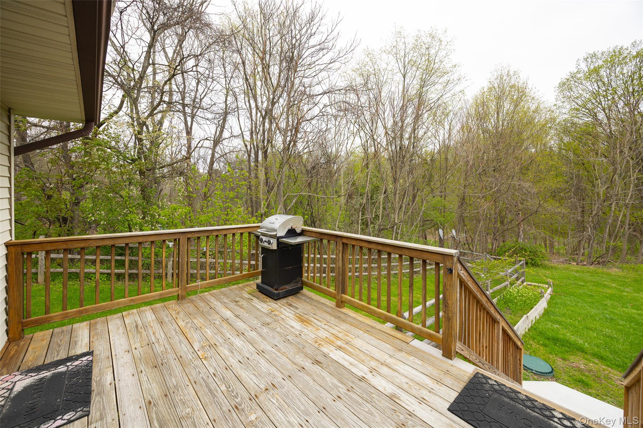 178 Overlook Road Poughkeepsie, NY 12603 - Photo 6 of 30 a view of a balcony with wooden floor and fence