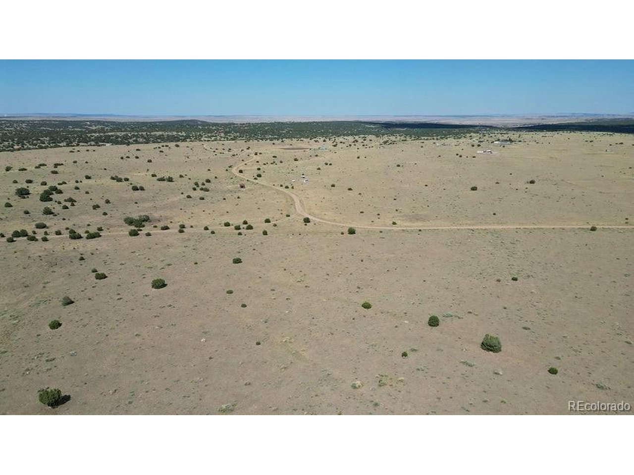 24 Rio Cucharas Phase 1 Walsenburg, CO 81089 - Photo 11 of 13 a black and white photo of a room