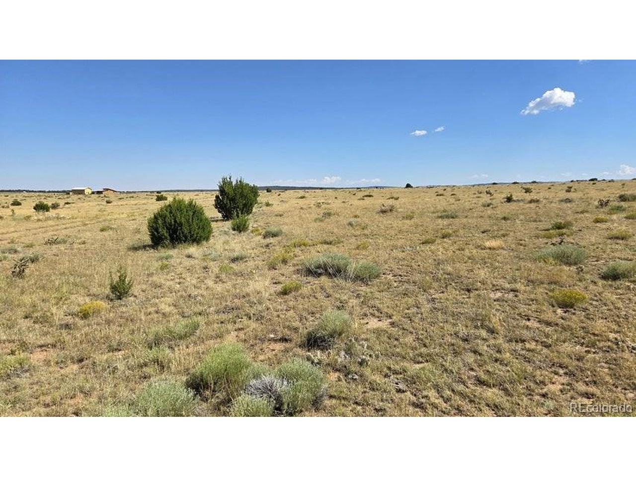 24 Rio Cucharas Phase 1 Walsenburg, CO 81089 - Photo 5 of 13 a open kitchen with a sink and painted walls