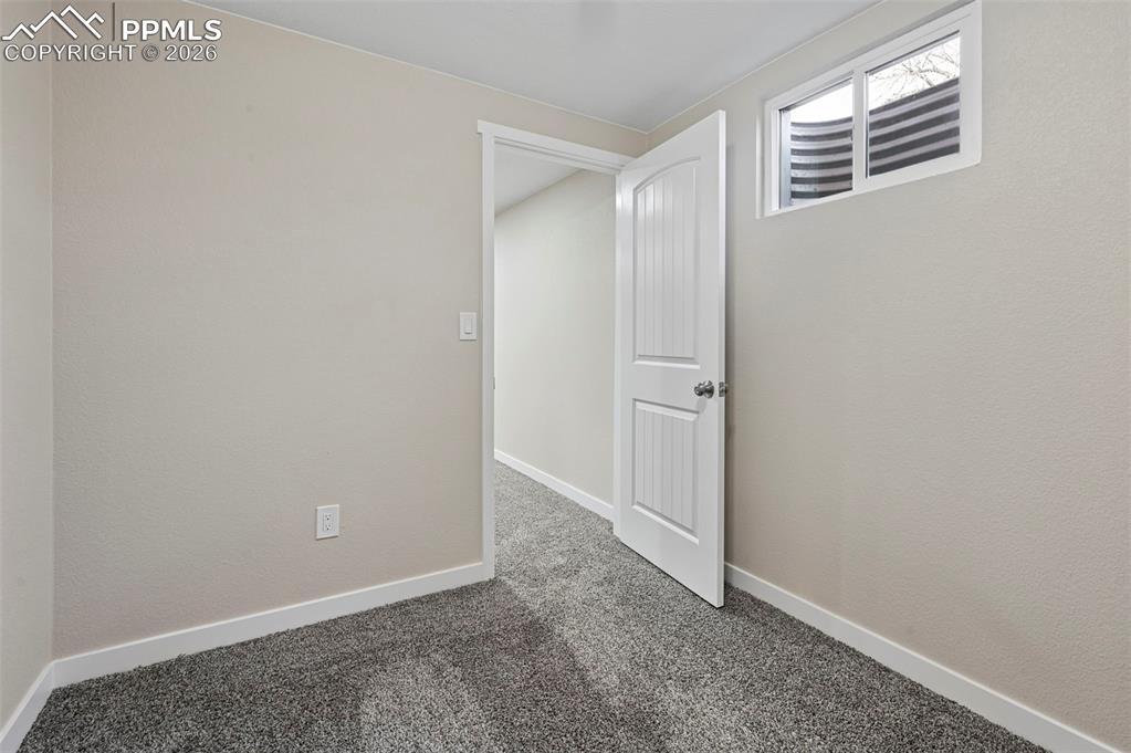 1901 Whitman Road Colorado Springs, CO 80910 - Photo 24 of 35 an empty room with windows