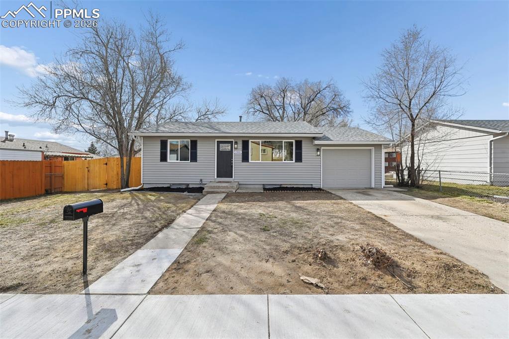 1901 Whitman Road Colorado Springs, CO 80910 - Photo 3 of 35 a front view of house with yard