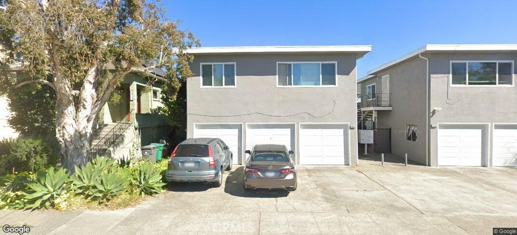 4806 Clarke Street, Unit 2 Oakland, CA 94609 - Photo 1 of 13 a front view of a house with entryway