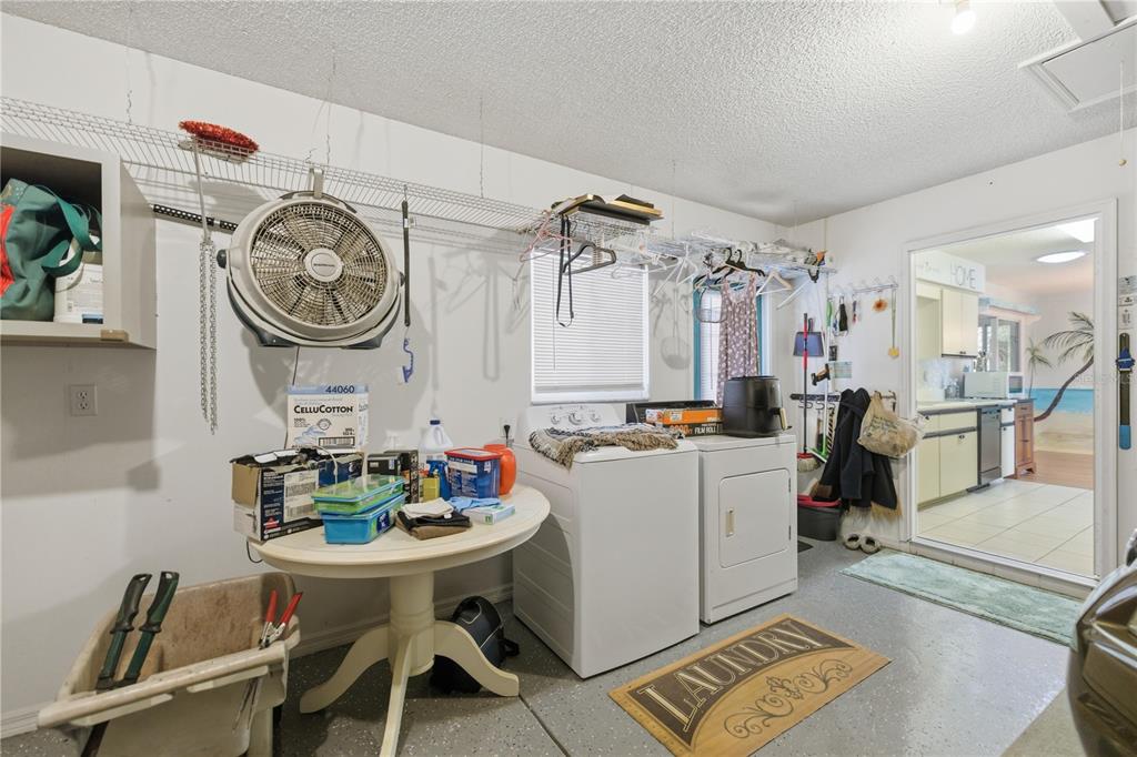 10689 Southeast 174th Loop Summerfield, FL 34491 - Photo 22 of 45 a view of a workspace with furniture and a window