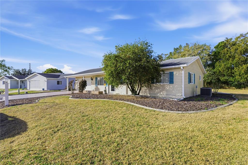 10689 Southeast 174th Loop Summerfield, FL 34491 - Photo 4 of 45 a view of a house with a patio