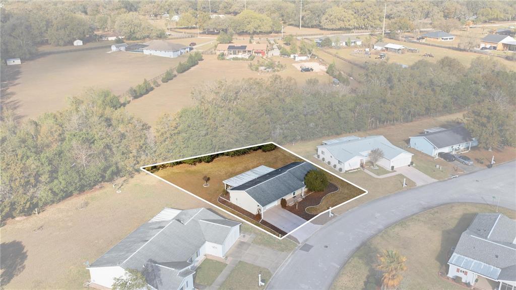 10689 Southeast 174th Loop Summerfield, FL 34491 - Photo 6 of 45 an aerial view of residential house with beach