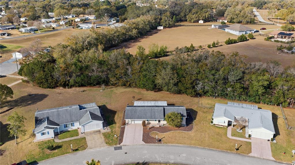 10689 Southeast 174th Loop Summerfield, FL 34491 - Photo 7 of 45 an aerial view of a house with outdoor space