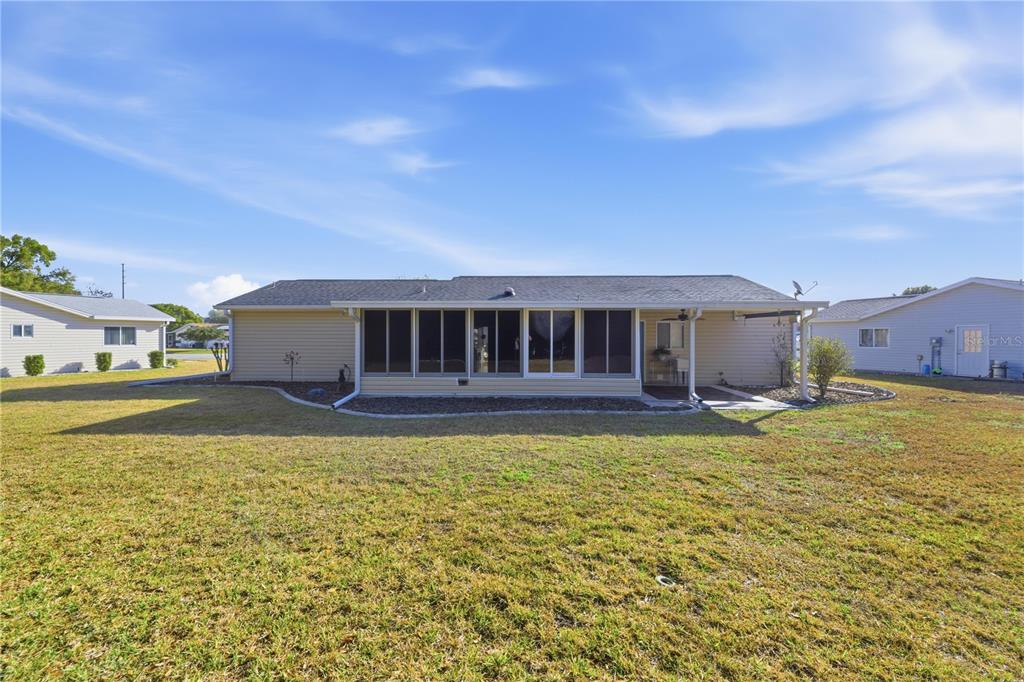 10689 Southeast 174th Loop Summerfield, FL 34491 - Photo 9 of 45 a view of a house with swimming pool