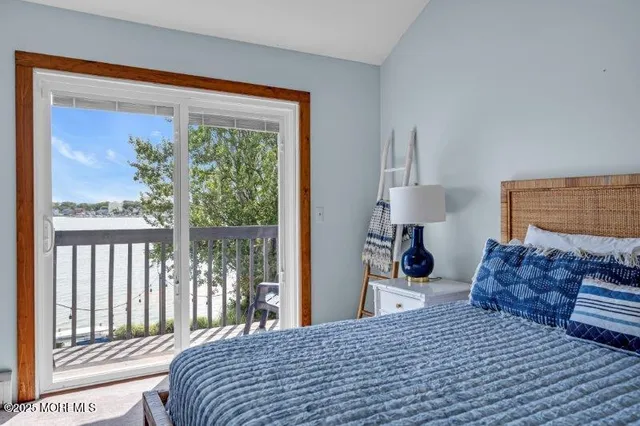 a view of a lake with a big yard