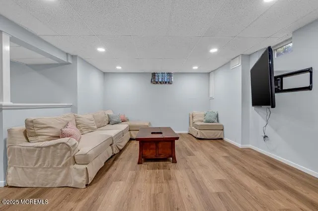 a view of a lake with outdoor seating and lake