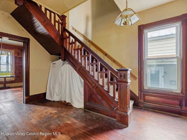 a view of an entryway with a front door