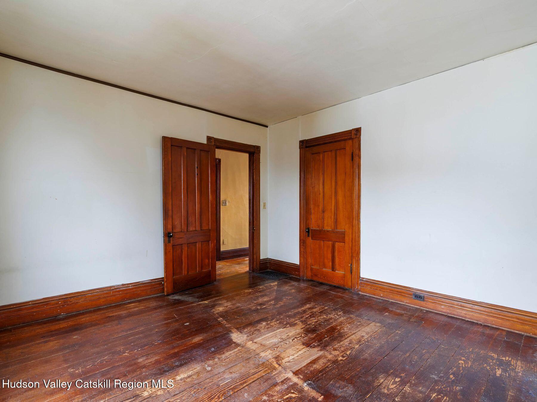 29 New Street Catskill, NY 12414 - Photo 27 of 46 a view of an empty room with wooden floor