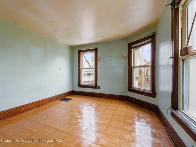 a view of an empty room and window