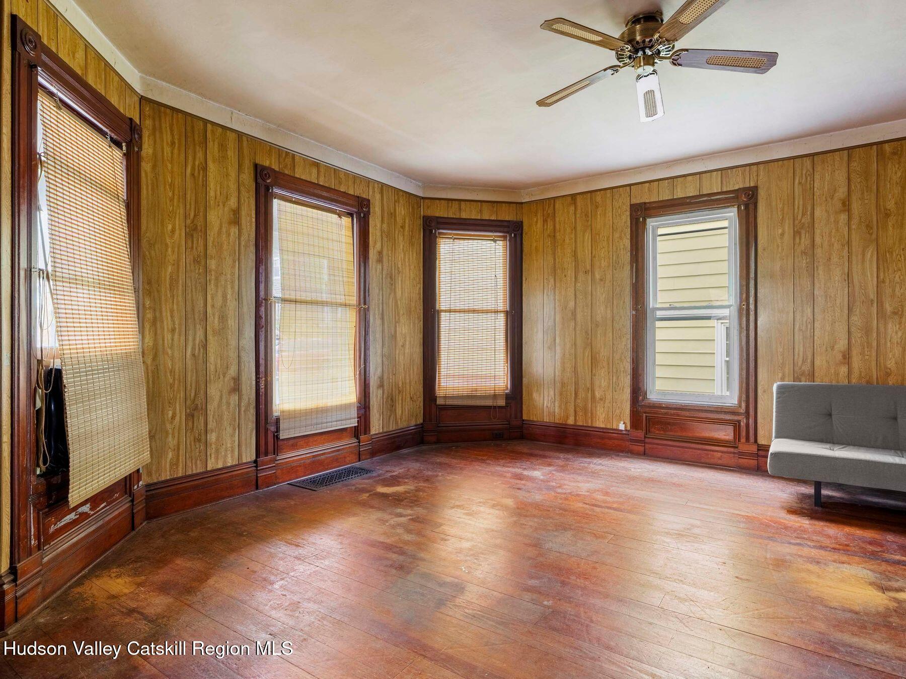 29 New Street Catskill, NY 12414 - Photo 7 of 46 a view of livingroom with hardwood floor and window