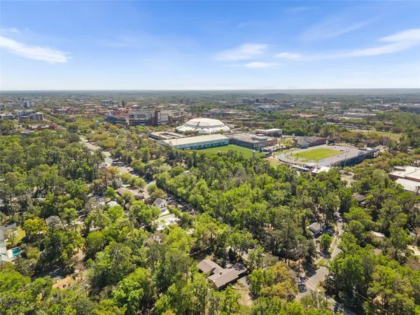 an aerial view of residential building with parking space