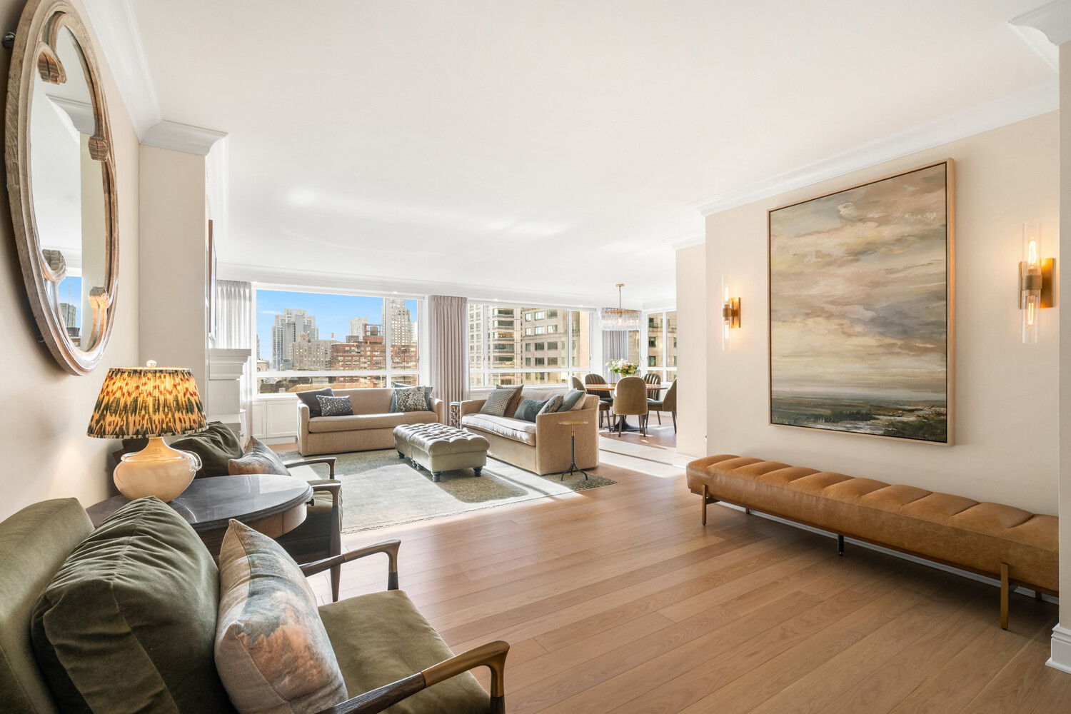 190 East 72nd Street, Unit 14D Manhattan, NY 10021 - Photo 1 of 12 a living room with furniture and a large window