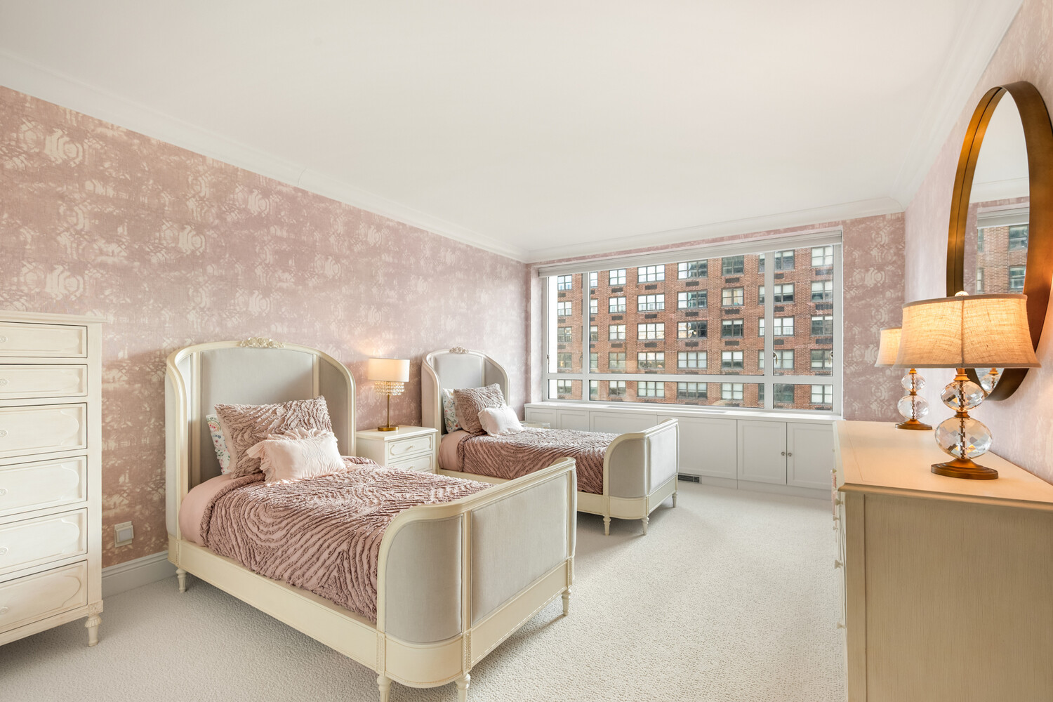 190 East 72nd Street, Unit 14D Manhattan, NY 10021 - Photo 8 of 12 a bedroom with a large bed and a large window