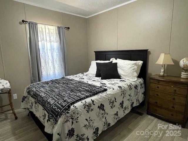 5759 Rumfelt Road Stanley, NC 28164 - Photo 8 of 10 a bedroom with a bed and window