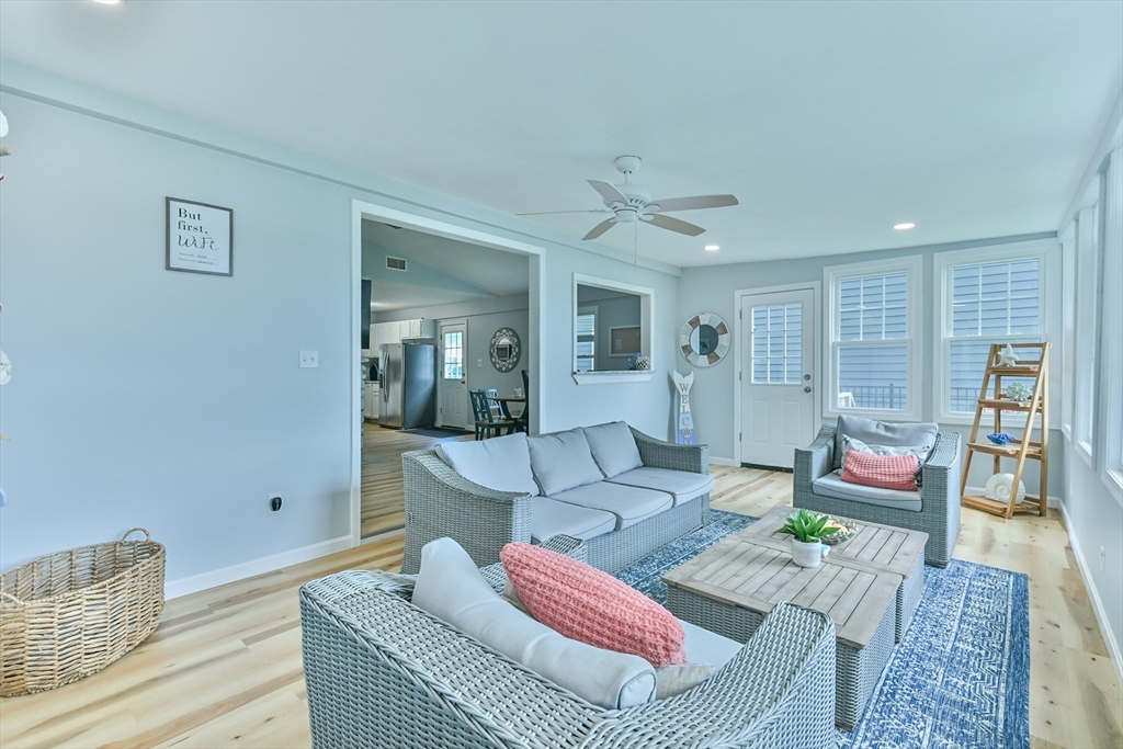 23 Lakeview Road Webster, MA 01570 - Photo 18 of 35 a living room with furniture and wooden floor