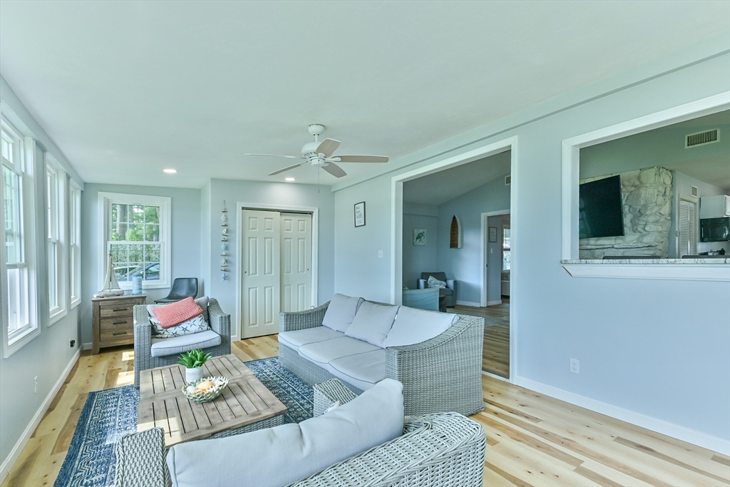 23 Lakeview Road Webster, MA 01570 - Photo 19 of 35 a living room with furniture and a flat screen tv