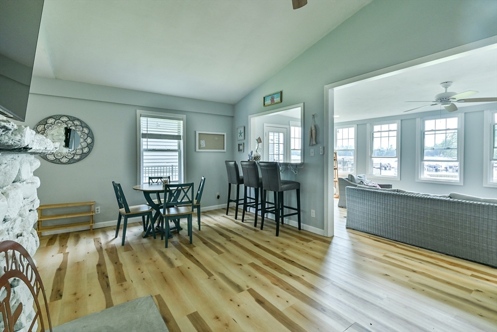 23 Lakeview Road Webster, MA 01570 - Photo 22 of 35 a view of a dining room with furniture window and wooden floor