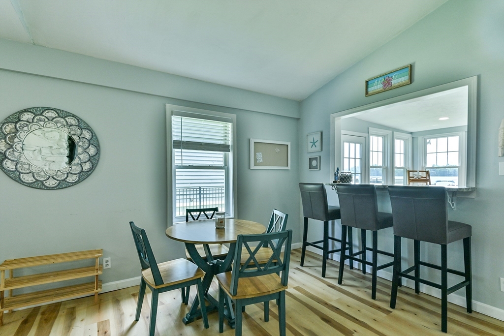23 Lakeview Road Webster, MA 01570 - Photo 24 of 35 a view of a dining room with furniture and wooden floor