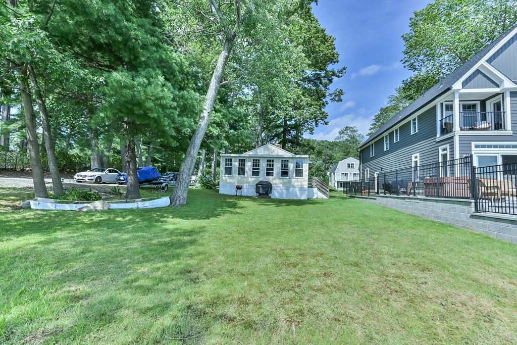 23 Lakeview Road Webster, MA 01570 - Photo 10 of 35 a view of a house with backyard and sitting area