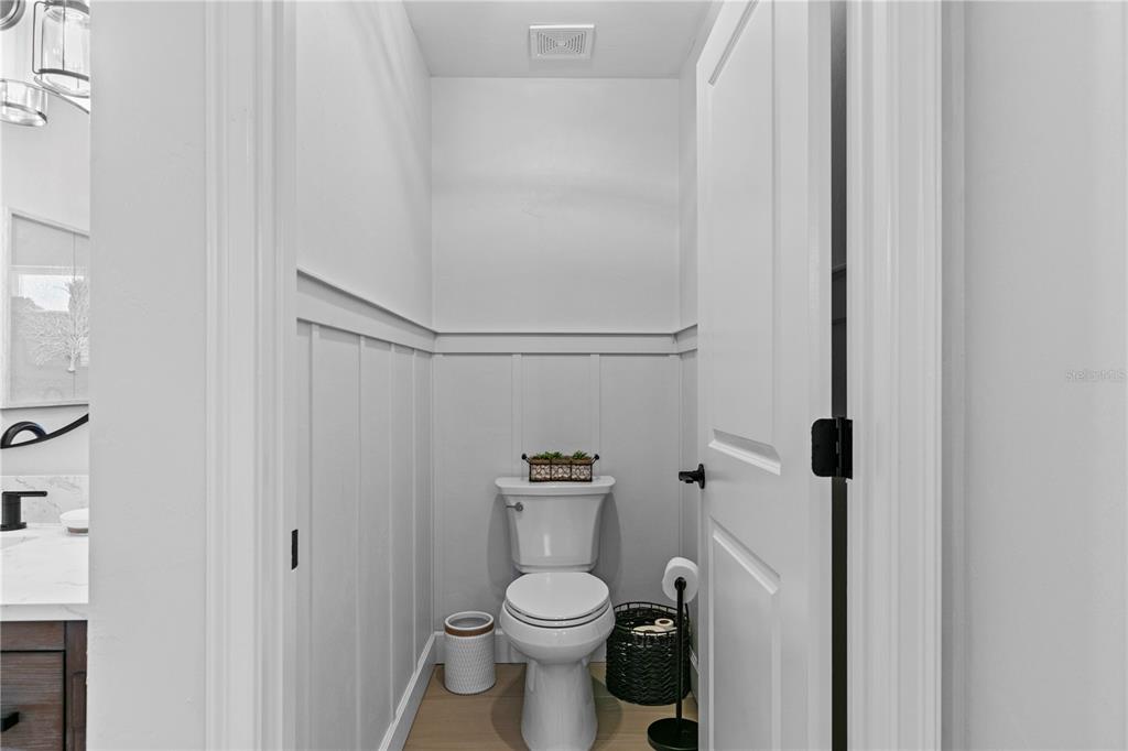 11981 Southwest 1st Road Gainesville, FL 32607 - Photo 37 of 49 a white toilet sitting next to a shower