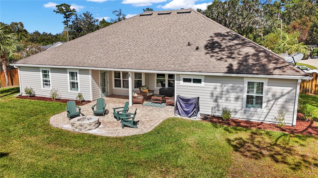 11981 Southwest 1st Road Gainesville, FL 32607 - Photo 43 of 49 a view of a house with backyard and sitting area