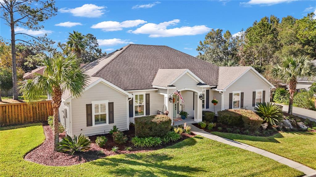 11981 Southwest 1st Road Gainesville, FL 32607 - Photo 47 of 49 a front view of a house with garden