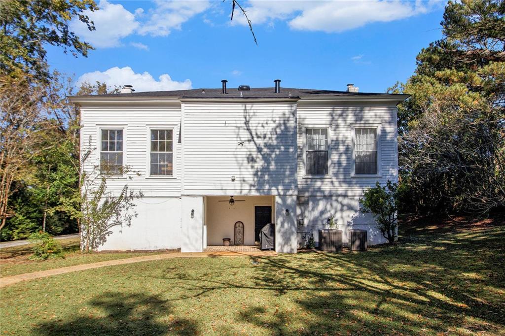112 Hillcrest Road West Point, GA 31833 - Photo 29 of 34 a front view of a house with a garden
