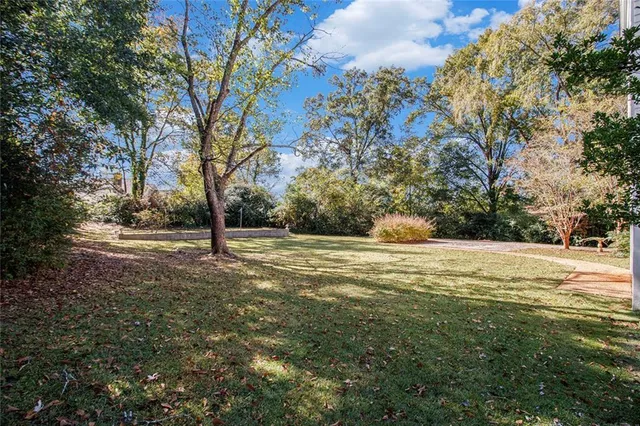 a picture of a bathroom with a shower