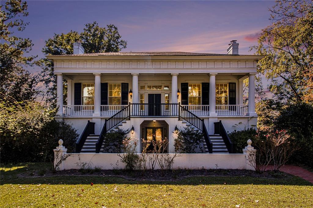 112 Hillcrest Road West Point, GA 31833 - Photo 32 of 34 a front view of a house with yard and garage