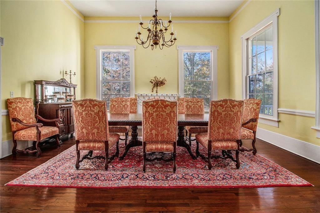 112 Hillcrest Road West Point, GA 31833 - Photo 8 of 34 a view of a dining room with furniture window and wooden floor
