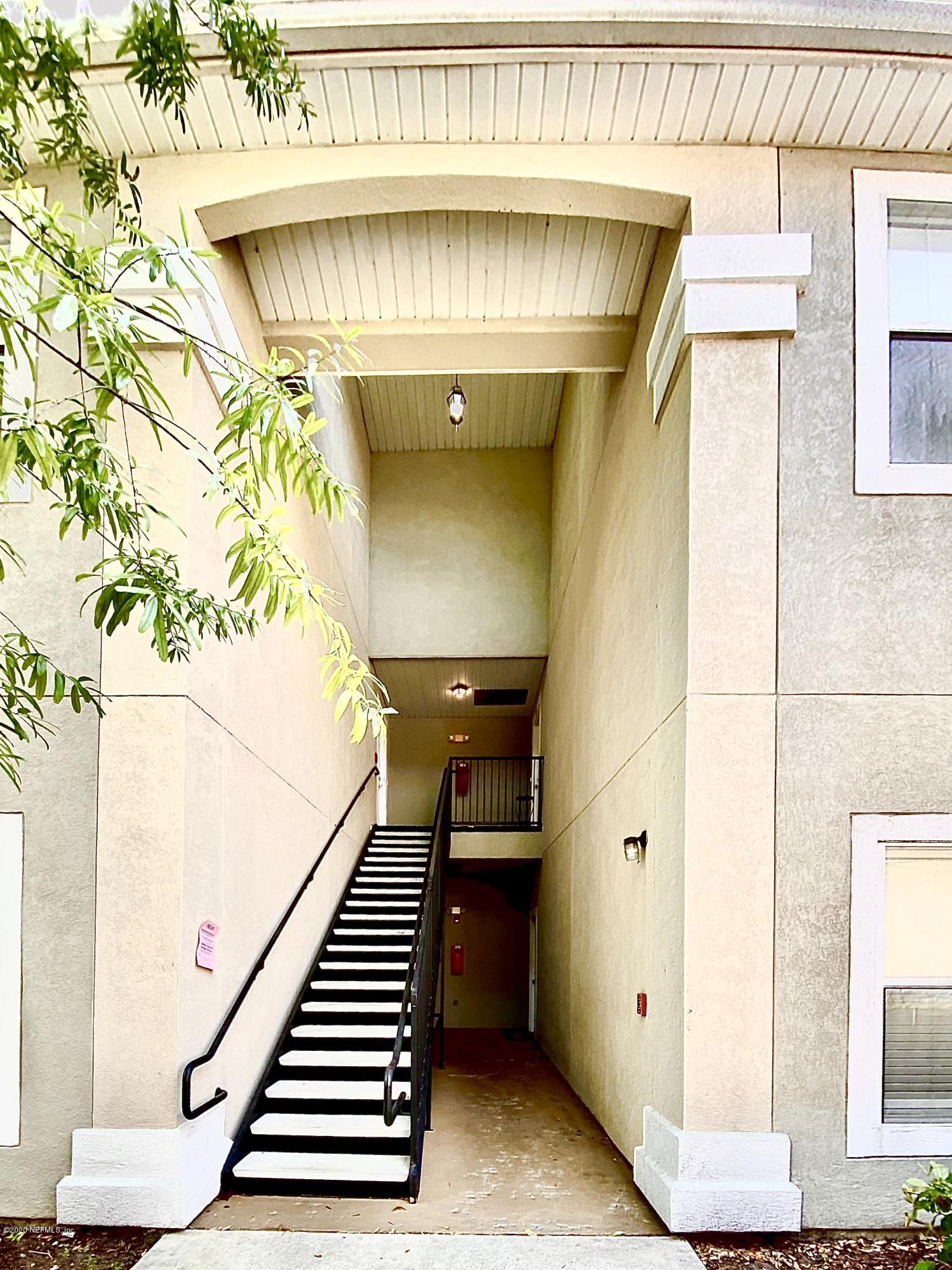 a view of entryway with a front door