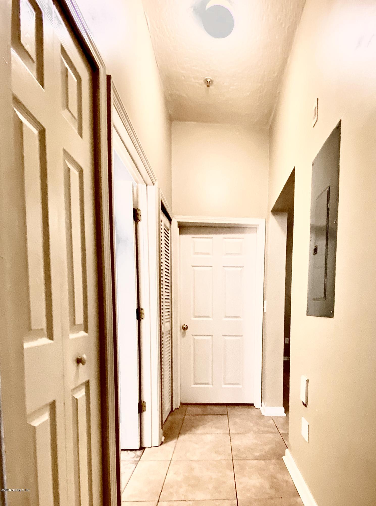 7920 Merrill Road, Unit 707 Jacksonville, FL 32277 - Photo 7 of 13 a view of front door