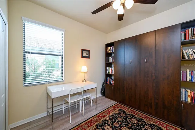 a workspace with furniture and window