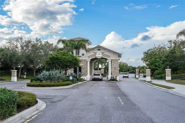 a view of a street with houses on both side