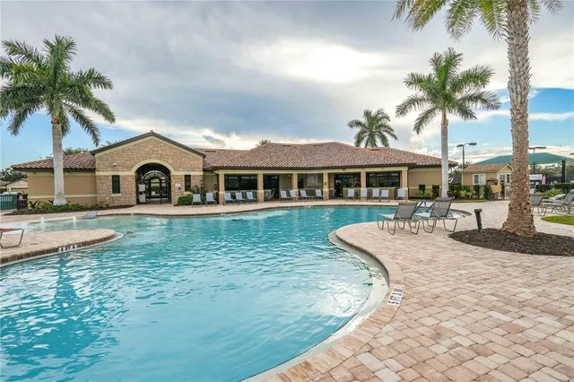 a front view of a house with swimming pool