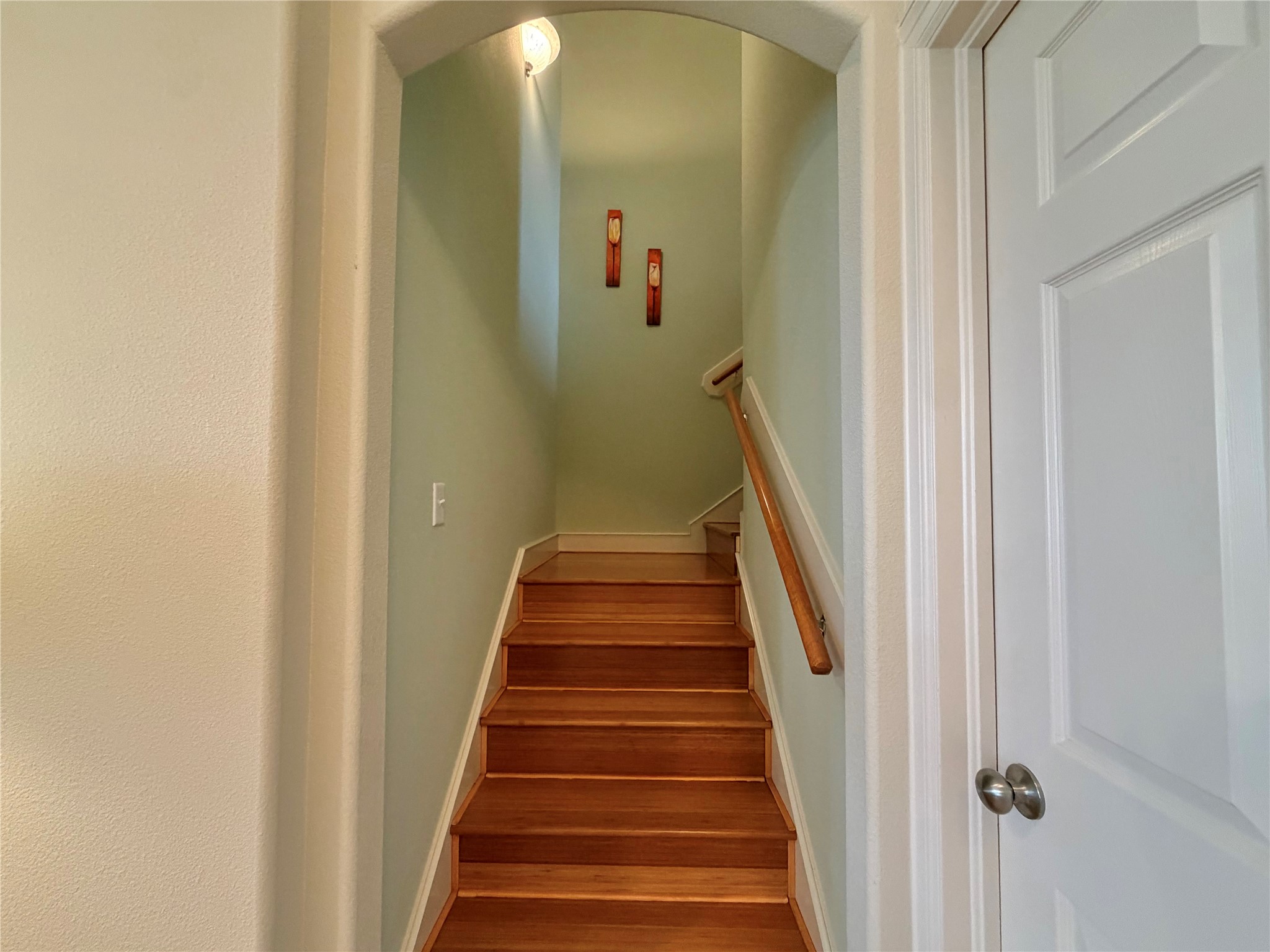 1448 South Blue Bonnet Lane Angleton, TX 77515 - Photo 32 of 43 a view of a hallway with wooden floor and entryway
