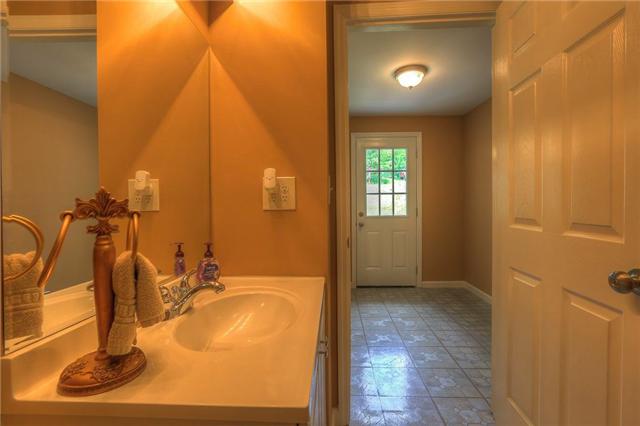 5088 Mt View Road Antioch, TN 37013 - Photo 8 of 13 The bathroom, looking out into the mud room.